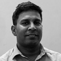 Instructor Praveen Interacting with Students